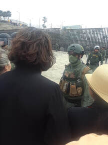 Stevie Carmody protesting at the U.S. Mexico Border